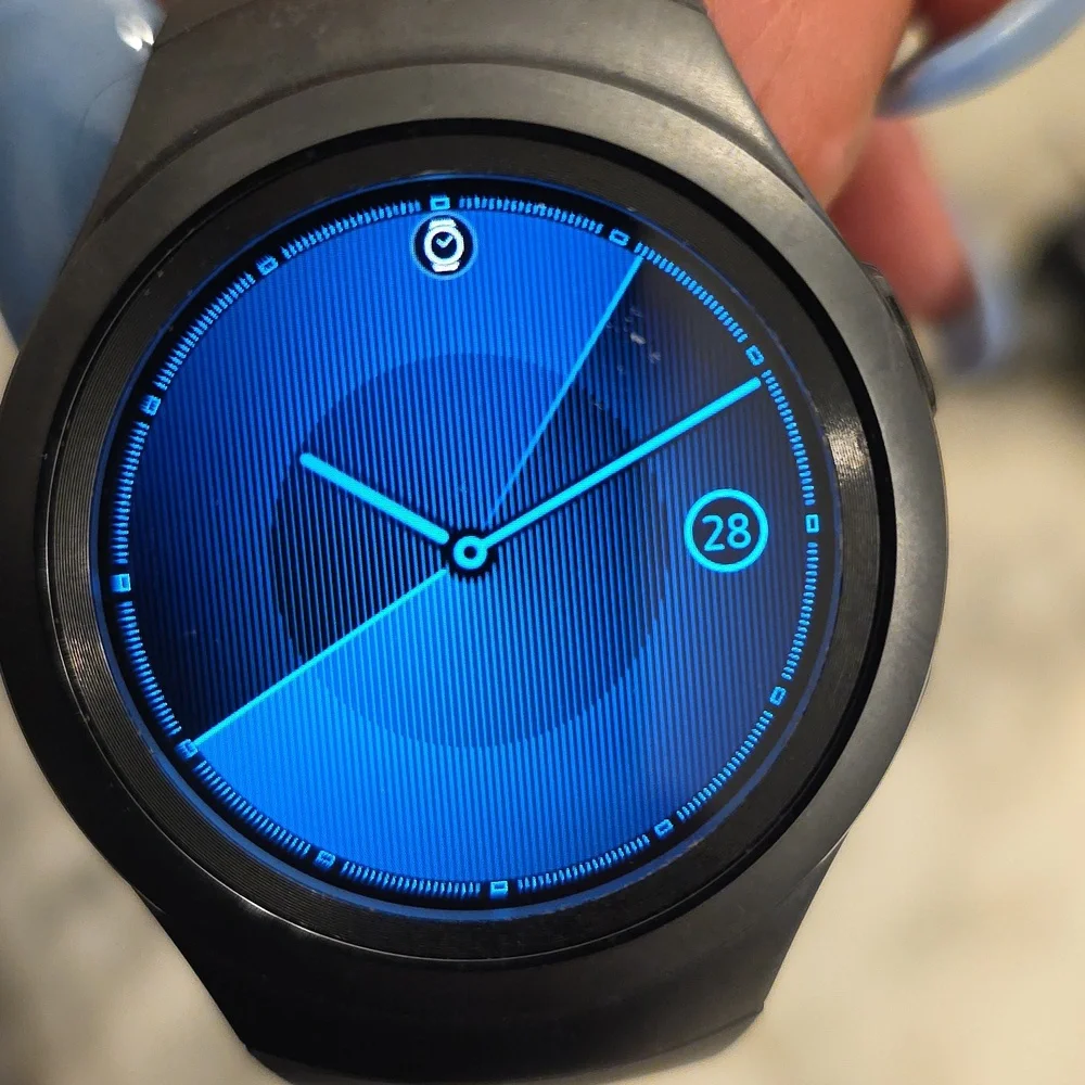 Samsung Smartwatch with Charging Stand.